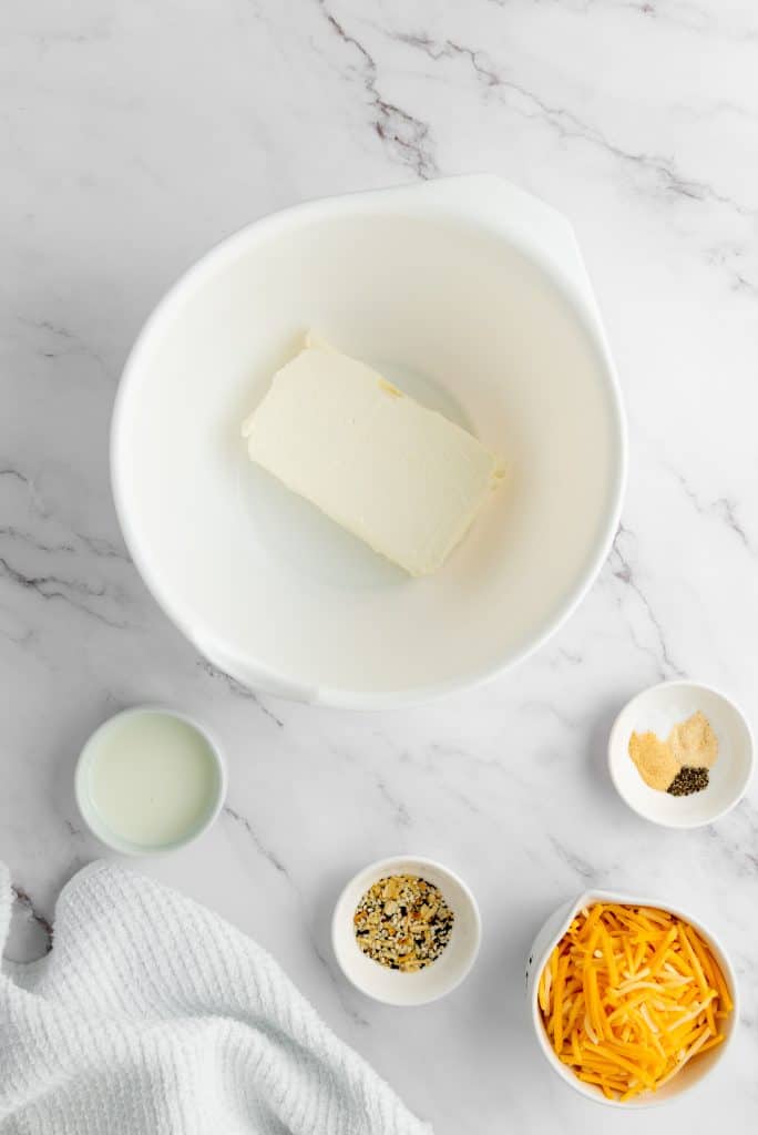 preparing the cheese for Pecan Bacon Cheeseball